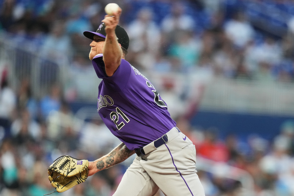 Colorado Rockies pitcher Kyle Freeland throws during the second inning of a baseball game against the Miami Marlins, Friday, March 27, 2026, in Miami. (AP Photo/Lynne Sladky)