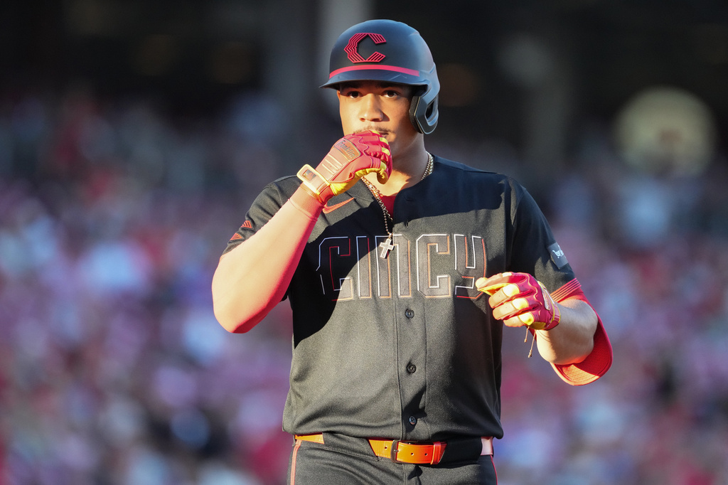 Cincinnati Reds' Noelvi Marte crosses home plate after hitting a solo home run during the second inning of a baseball game against the Arizona Diamondbacks, Friday, June 12, 2026, in Cincinnati. (AP Photo/Kareem Elgazzar)