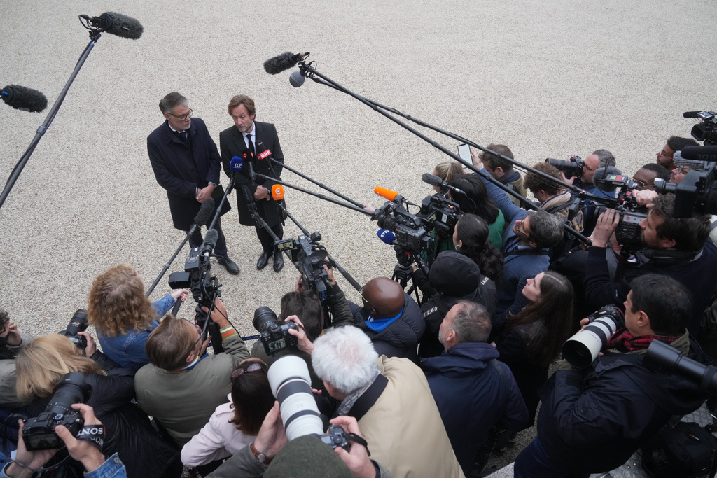French socialist party secretary general Olivier Faure, left, and Boris Vallaud, president of the socialist parliament members at the National Assembly speak to medias after a meeting with French president Emmanuel Macron at the Elysee Palace, in Paris, Friday, Oct. 10, 2025. (AP Photo/Thibault Camus)