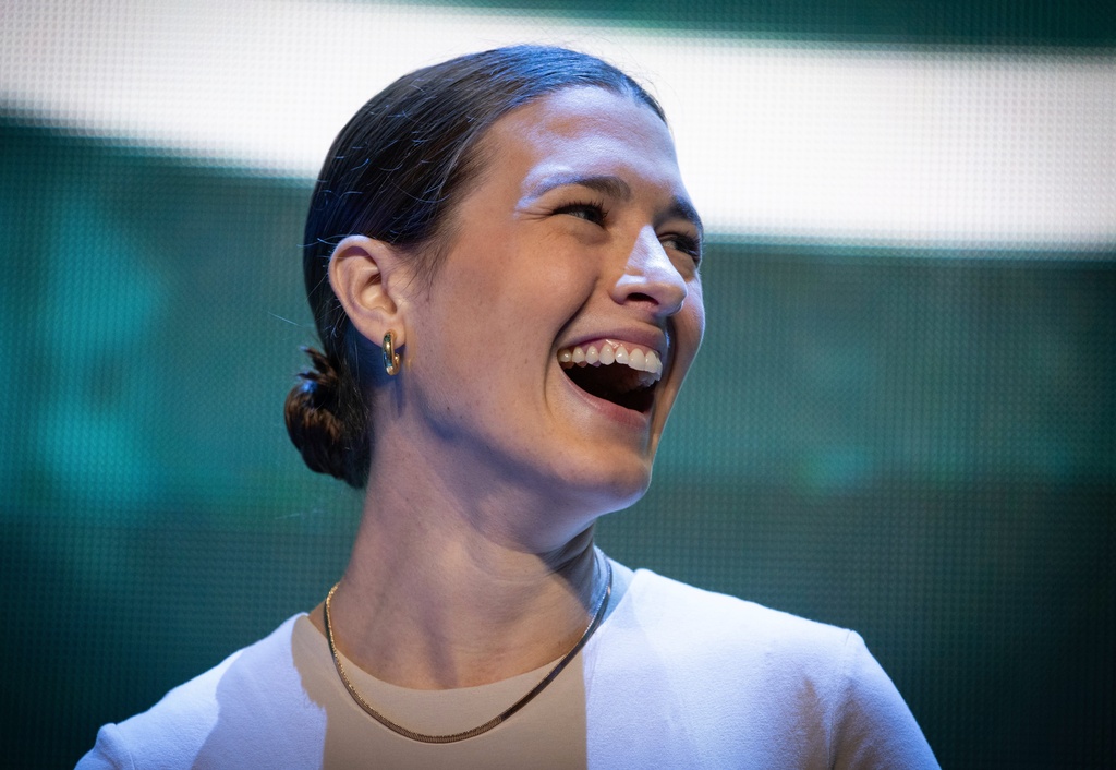 Seattle Torrent general manager Meghan Turner reacs during an event unveiling the PWHL hockey team's new logo and name, Thursday, Nov. 6, 2025, in Seattle. (Ken Lambert/The Seattle Times via AP)