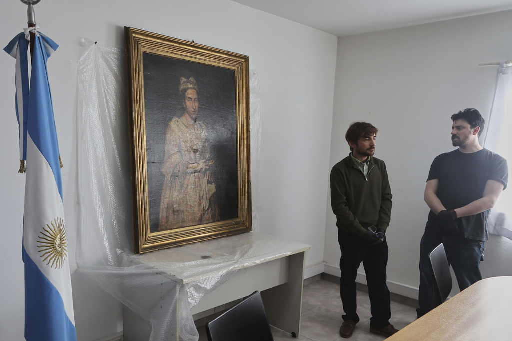 Giuseppe Ghislandi's 18th-century painting "Portrait of a Lady," reportedly stolen by a Nazi officer during World War II and discovered in the home of his daughter after appearing in a real estate listing, is displayed during a press conference by Prosecutor Daniel Adler in Mar del Plata, Argentina, Wednesday, Sept. 3, 2025. (AP Photo/Christian Heit)