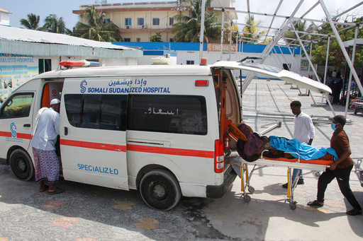 A patient is helped into an ambulance after an hours-long militant attack in Mogadishu, Somalia, on Sunday, Oct. 5, 2025. (AP Photo/Farah Abdi Warsameh) A patient is helped into an ambulance after an hours-long militant attack in Mogadishu, Somalia, on Sunday, Oct. 5, 2025. (AP Photo/Farah Abdi Warsameh)
