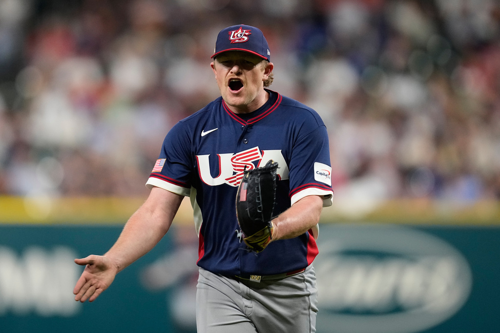 United States pitcher Logan Webb reacts after striking out Canada third baseman Abraham Toro (31) to end the first inning of a World Baseball Classic quarterfinal game, Friday, March 13, 2026, in Houston. (AP Photo/David J. Phillip)