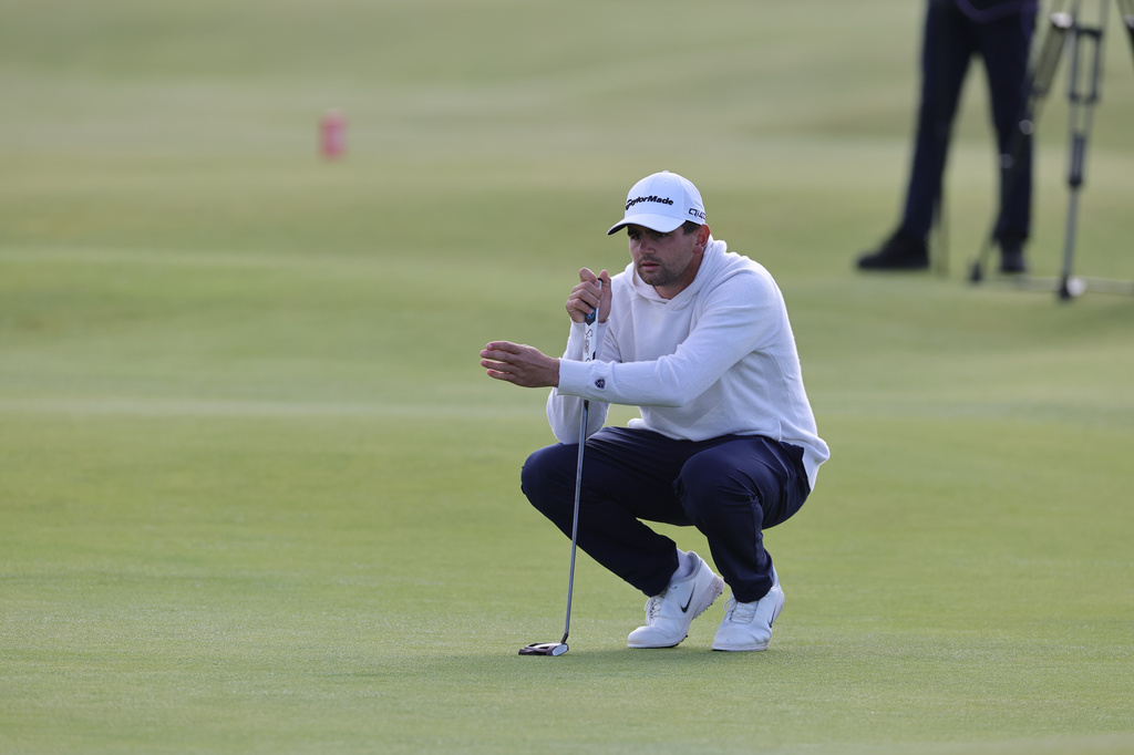 Casey Jarvis of South Africa lines up a putt on day three of the Dunhill Links Golf Championship in St Andrews, Scotland, Saturday, Oct. 3, 2026. (Steve Welsh/PA via AP)