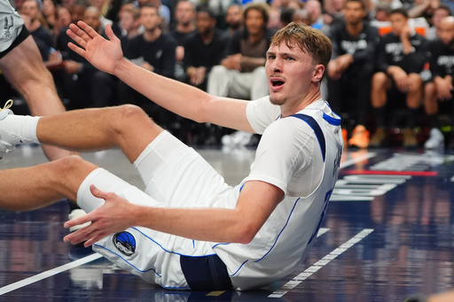 Dallas Mavericks forward Cooper Flagg reacts to a no-foul call during the second half of an NBA basketball game against the San Antonio Spurs in Dallas, Wednesday, Oct. 22, 2025. (AP Photo/LM Otero) Dallas Mavericks forward Cooper Flagg reacts to a no-foul call during the second half of an NBA basketball game against the San Antonio Spurs in Dallas, Wednesday, Oct. 22, 2025. (AP Photo/LM Otero)
