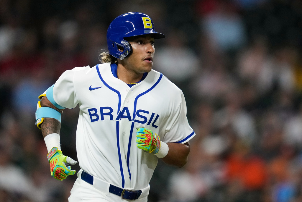 Brazil's Lucas Ramirez runs the bases after hitting a solo home run during the first inning of a World Baseball Classic game, Friday, March 6, 2026, in Houston. (AP Photo/Ashley Landis)