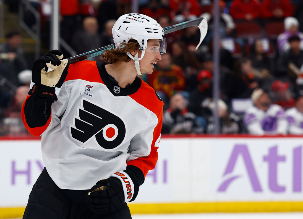 Philadelphia Flyers center Trevor Zegras (46) reacts after scoring a goal against the New Jersey Devils during the second period of an NHL hockey game, Saturday, Nov. 29, 2025, in Newark, N.J. (AP Photo/Noah K. Murray)