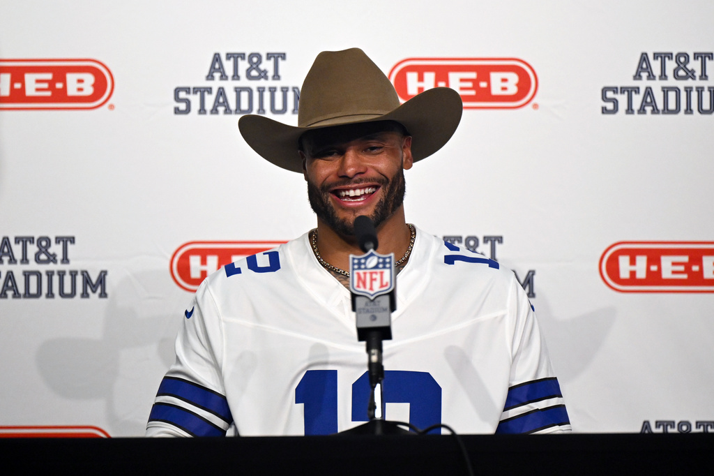 Dallas Cowboys quarterback Dak Prescott speaks in a press conference after an NFL football game against the Washington Commanders in Arlington, Texas, Sunday, Sept. 20, 2026. (AP Photo/Jessica Tobias)