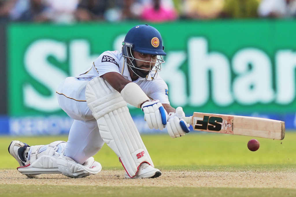 Sri Lanka's Sonal Dinusha plays a shot during the day three of the first cricket test match between Sri Lanka and India In Galle, Sri Lanka, Monday, Aug. 17, 2026. (AP Photo/Eranga Jayawardena)