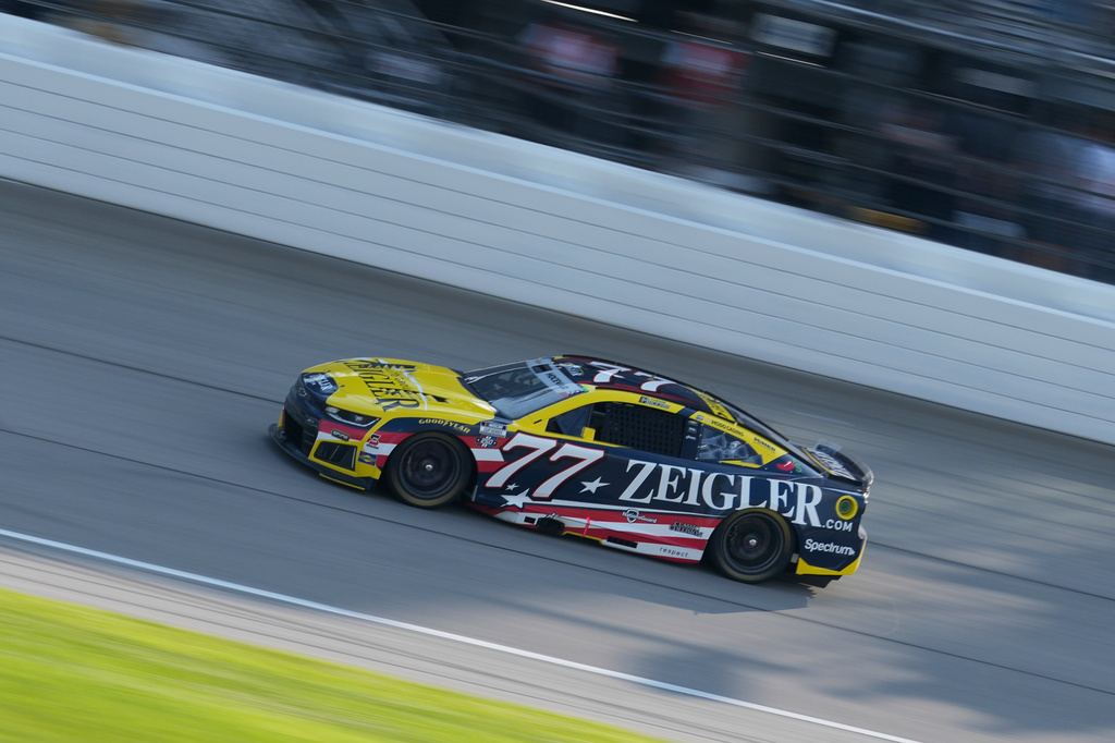 Carson Hocevar (77) drives during a NASCAR Cup Series auto race at Chicagoland Speedway in Joliet, Ill., Sunday, July 5, 2026. (AP Photo/Nam Y. Huh)