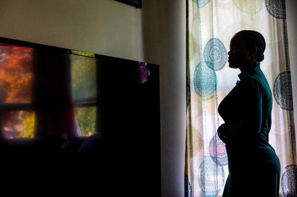 FILE - A Congolese refugee, a plaintiff in a federal lawsuit over the Trump administration's move to shut down the "join-to-follow" refugee program, poses at her home in Boise, Idaho, June 23, 2025. (AP Photo/Kyle Green, file)