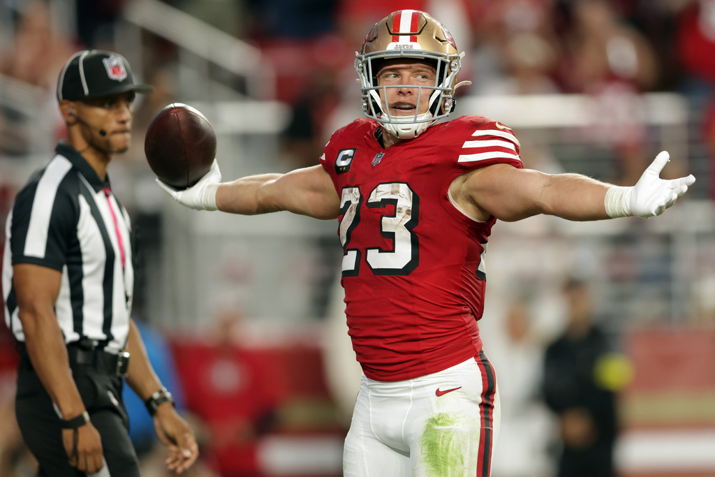 San Francisco 49ers' Christian McCaffrey celebrates a second-quarter touchdown run against the Atlanta Falcons during an NFL football game in Santa Clara, Calif., on Sunday, Oct. 19, 2025. (Scott Strazzantez/San Francisco Chronicle via AP)