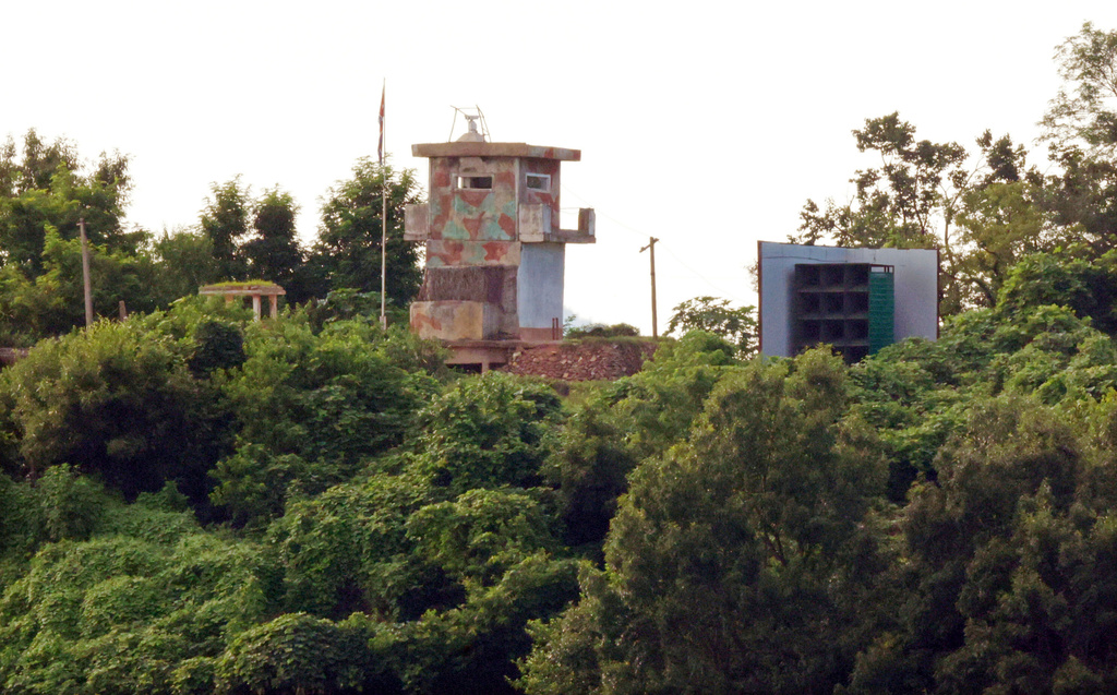 A North Korean military guard post, left, and loudspeaker are seen from Paju, South Korea, near the border with North Korea, Saturday, Aug. 9, 2025. (Kim In-chul/Yonhap via AP)