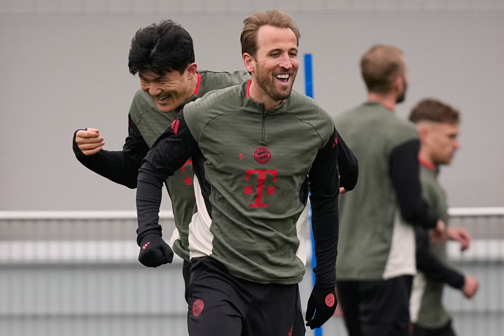 Bayern's Kim Min-jae and Bayern's Harry Kane exercise during a training session ahead of the Champions League quarterfinal second leg soccer match between Bayern Munich and Real Madrid in Munich, Germany, Tuesday, April 14, 2026. (AP Photo/Matthias Schrader)