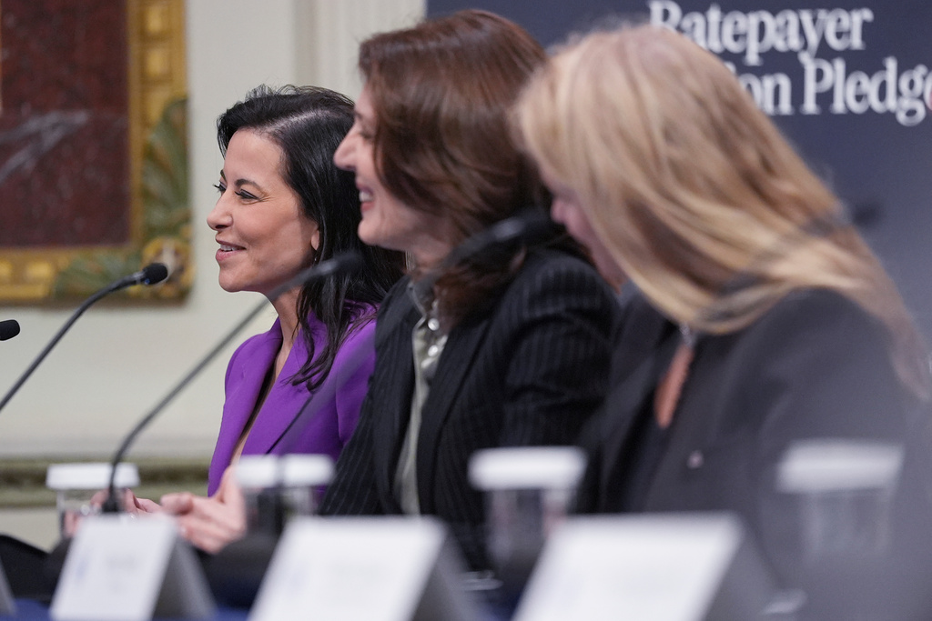 Meta President Dina Powell, left, speaks during an event about the Ratepayer Protection Pledge, in the Indian Treaty Room of the Eisenhower Executive Office Building on the White House complex, Wednesday, March 4, 2026, in Washington. (AP Photo/Jacquelyn Martin)