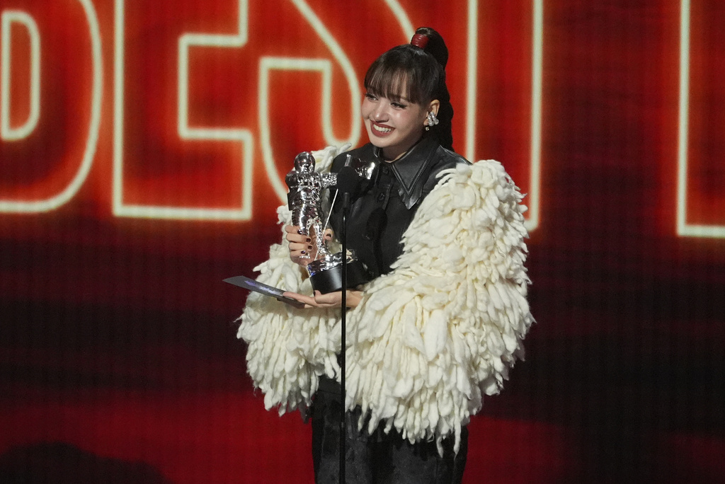 Lisa accepts the award for best pop for "Dream feat. Kentara Sakaguchi" during the MTV Video Music Awards on Sunday, Sept. 27, 2026, at the Peacock Theater in Los Angeles. (AP Photo/Chris Pizzello)