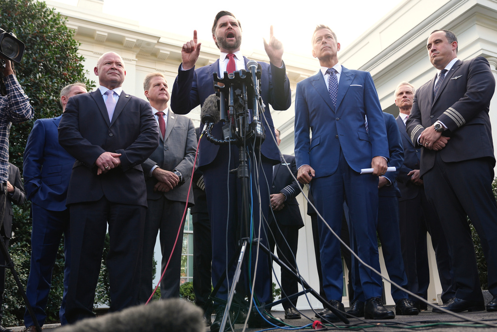 Vice President JD Vance speaks to the media alongside Sean O'Brien, President of the International Brotherhood of Teamsters, from left, Chris Sununu, president & CEO of Airlines for America, and Transportation Secretary Sean Duffy, and aviation industry representatives, about the impact of the government shutdown on the aviation industry, outside of the West Wing of the White House, Thursday, Oct. 30, 2025, in Washington. (AP Photo/Jacquelyn Martin)