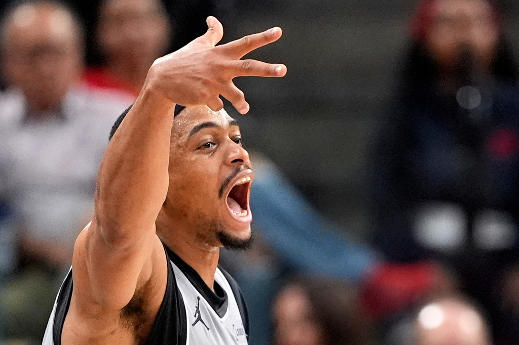 San Antonio Spurs forward Keldon Johnson celebrates after scoring during the second half of an NBA basketball game against the Los Angeles Clippers, Thursday, April 2, 2026, in Inglewood, Calif. (AP Photo/Mark J. Terrill)