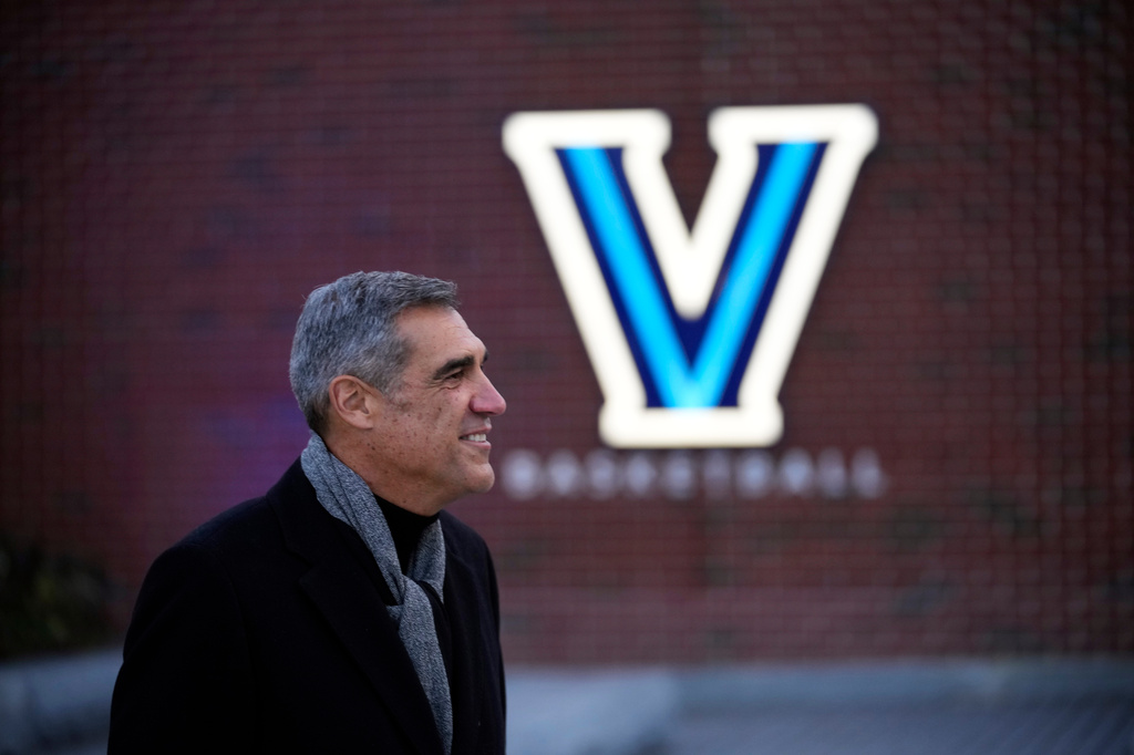 FILE - Former Villanova men's basketball coach Jay Wright walks to a dedication ceremony before an NCAA college basketball game between Villanova and Saint Joseph's, Nov. 29, 2023, in Villanova, Pa. (AP Photo/Matt Slocum, File)