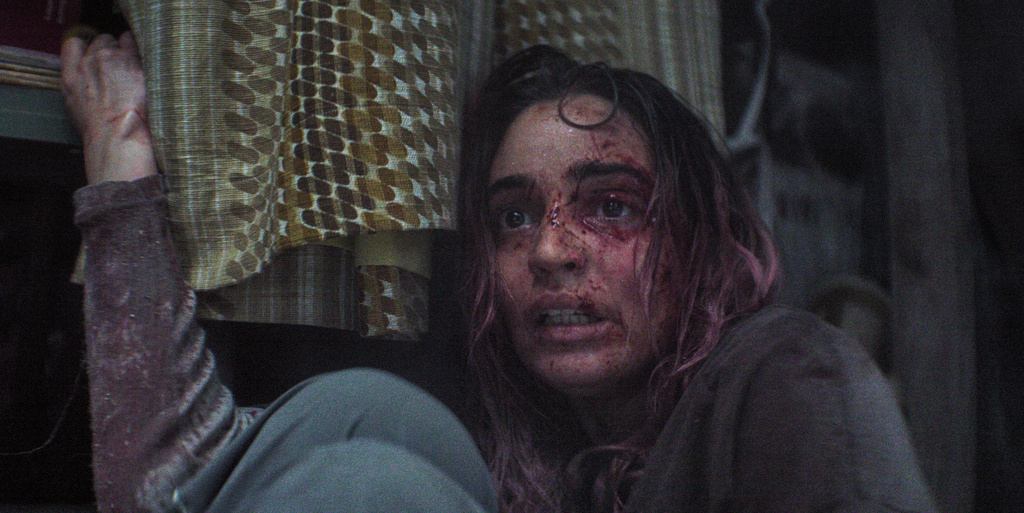 This image released by Warner Bros. Pictures shows Souheila Yacoub in a scene from "Evil Dead Burn." (Warner Bros. Pictures via AP)