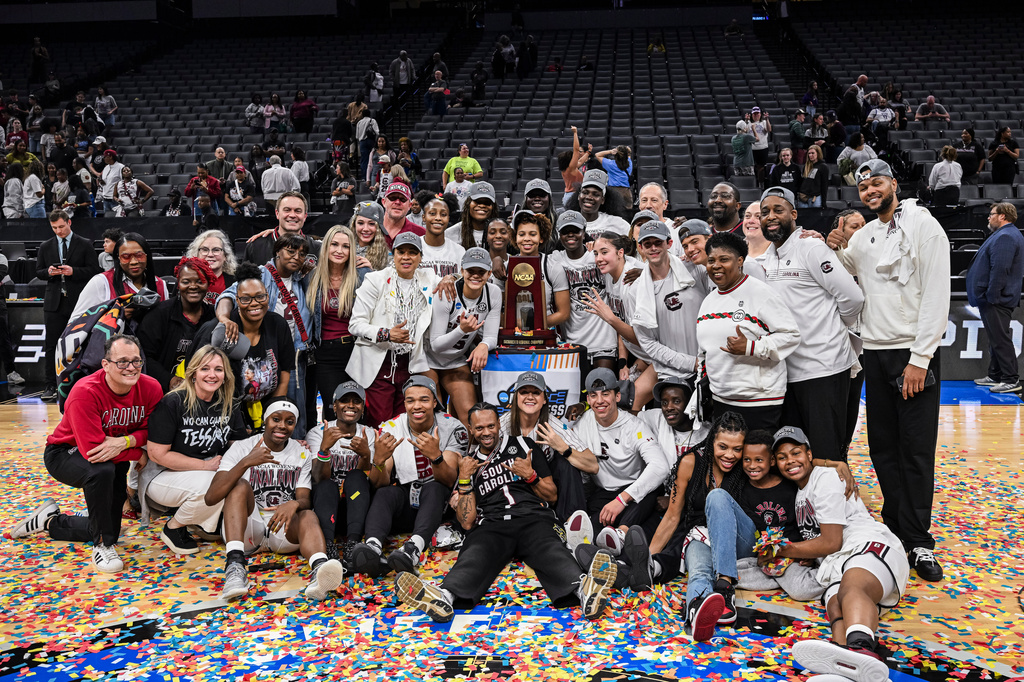 South Carolina poses for a photo after defeating TCU in the Elite Eight of the NCAA college basketball tournament Monday, March 30, 2026, in Sacramento, Calif. (AP Photo/Justine Willard)
