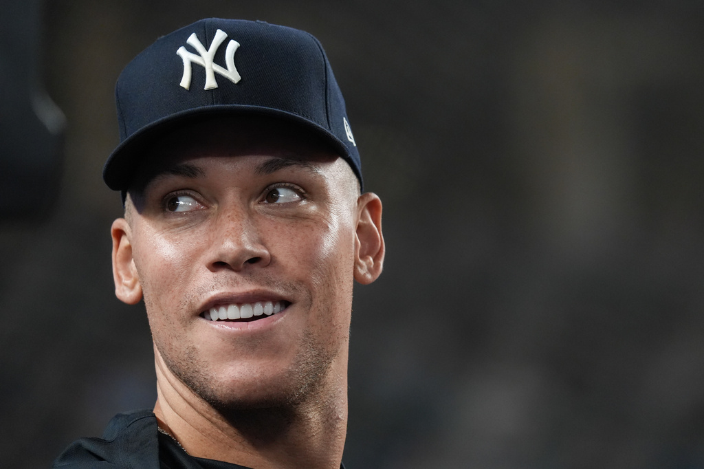 New York Yankees' Aaron Judge smiles towards fans during a baseball game against the Houston Astros, Wednesday, Aug. 26, 2026, in New York. (AP Photo/Ryan Murphy)