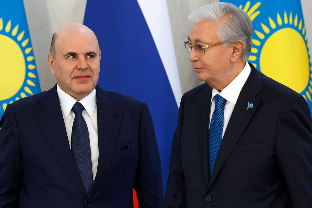 Kazakhstan's President Kassym-Jomart Tokayev, right, and Russian Prime Minister Mikhail Mishustin pose for a photo during their meeting in Astana, Kazakhstan, on Thursday, March 26, 2026.(Dmitry Astakhov, Sputnik, Government Pool Photo via AP)