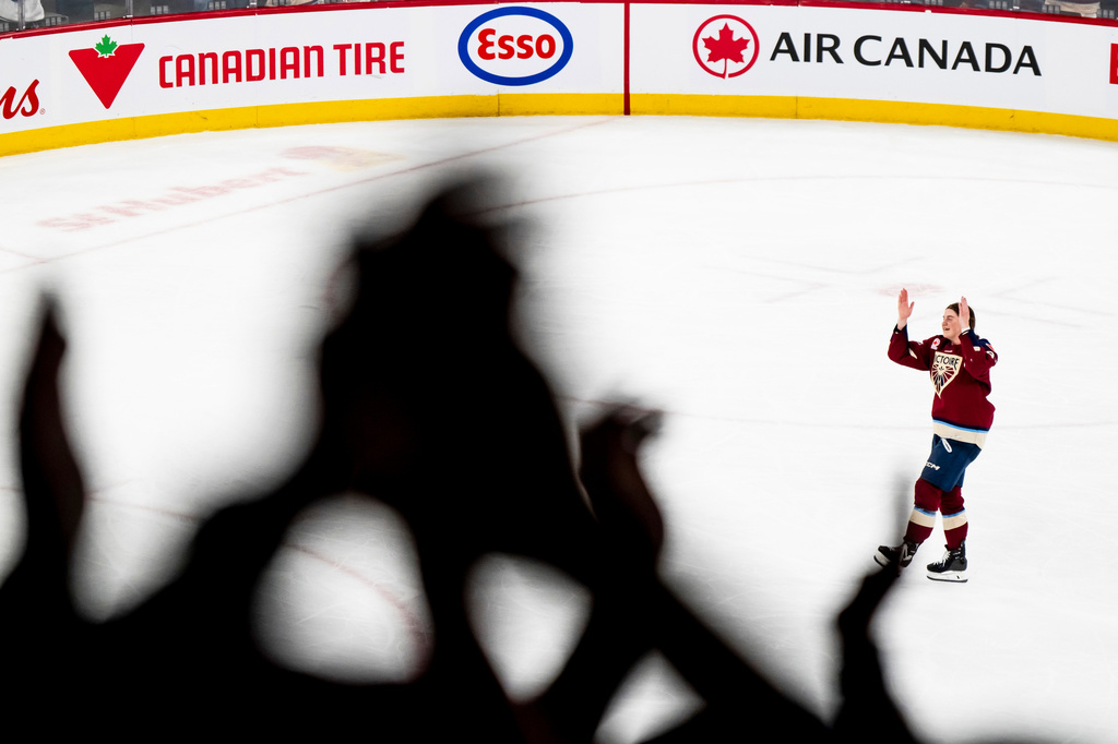 Fans cheer on Montreal Victoire's Maggie Flaherty (91) after she scored the winning goal against Ottawa Charge during overtime in Game 2 of the PWHL Walter Cup finals hockey series in Laval, Quebec, Saturday, May 16, 2026.(Christopher Katsarov/The Canadian Press via AP)