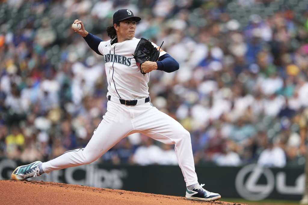 Seattle Mariners starting pitcher Bryan Woo throws during the second inning of a baseball game against the San Diego Padres, Wednesday, Aug. 27, 2025, in Seattle. (AP Photo/Lindsey Wasson)