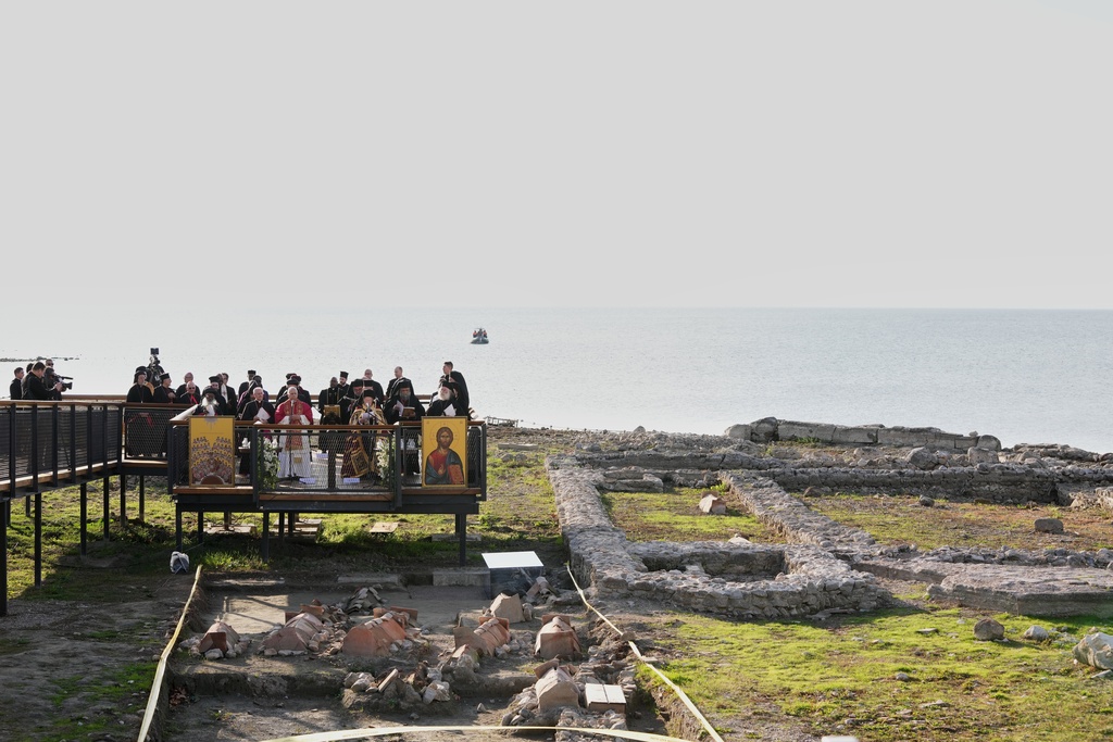 Pope Leo XIV and the Ecumenical Patriarch Bartholomew I lead an Ecumenical prayer service near the archaeological excavations of the ancient Basilica of Saint Neophytos, in Iznik, Turkey, Friday, Nov. 28, 2025. (AP Photo/Domenico Stinellis)