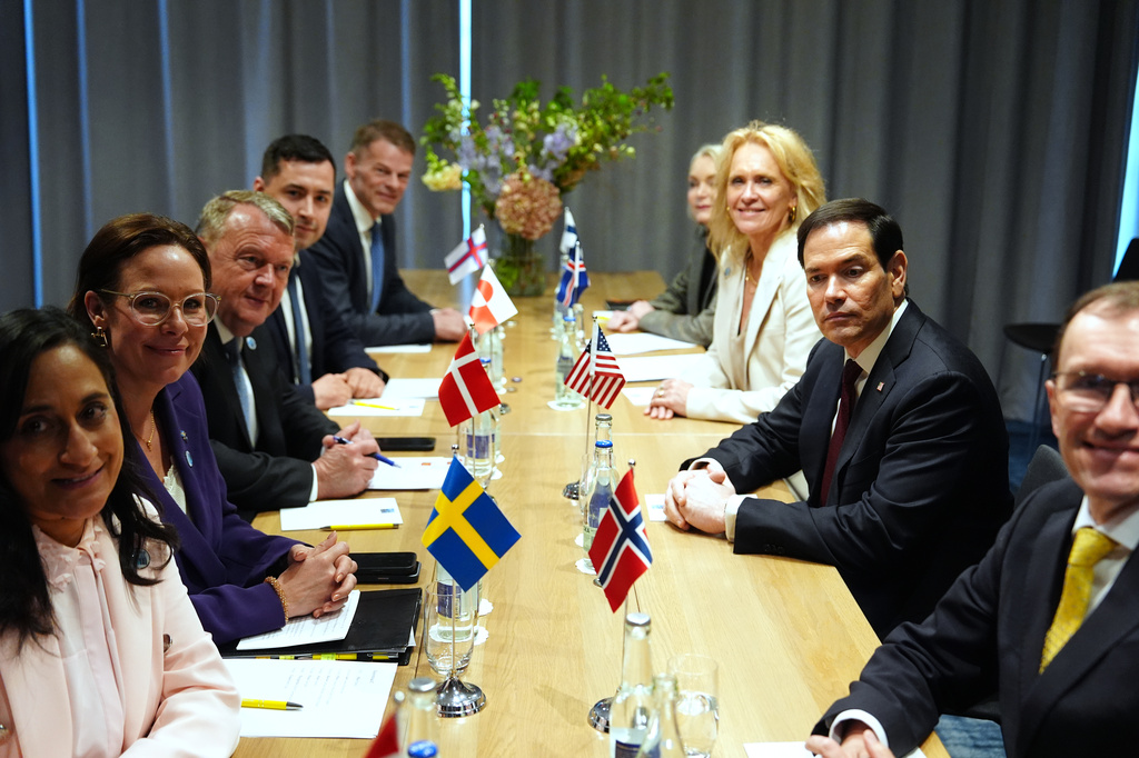 Iceland's Foreign Minister Katrin Gunnarsdottir, third right, United States Secretary of State Marco Rubio, second right, and Norway's Foreign Minister Espen Barth Eide, right, pose with from left, Canada's Foreign Minister Anita Anand, Sweden's Foreign Minister Maria Malmer Stenergard, and Denmark's Foreign Minister Lars Lokke Rasmussen during a meeting of the Arctic 7 on the sidelines of a meeting of NATO foreign ministers in Helsingborg, Sweden, Friday, May 22, 2026. (AP Photo/Julia Demaree Nikhinson, Pool)