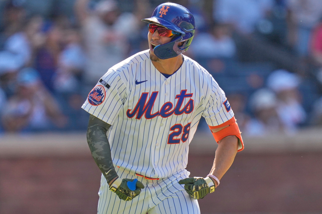 New York Mets' Tyrone Taylor reacts after hitting a three-run home run during the ninth inning of a baseball game against the New York Yankees, Sunday, May 17, 2026, in New York. (AP Photo/Seth Wenig)