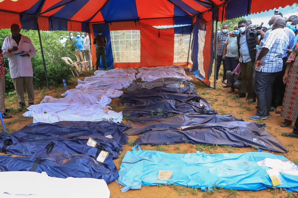 FILE - Body bags are laid out at the scene where dozens of bodies, believed to be followers of extremist evangelical leader Paul Mackenzie, were found in shallow graves in the village of Shakahola, near the coastal city of Malindi, in southern Kenya, April 24, 2023. (AP Photo, File)