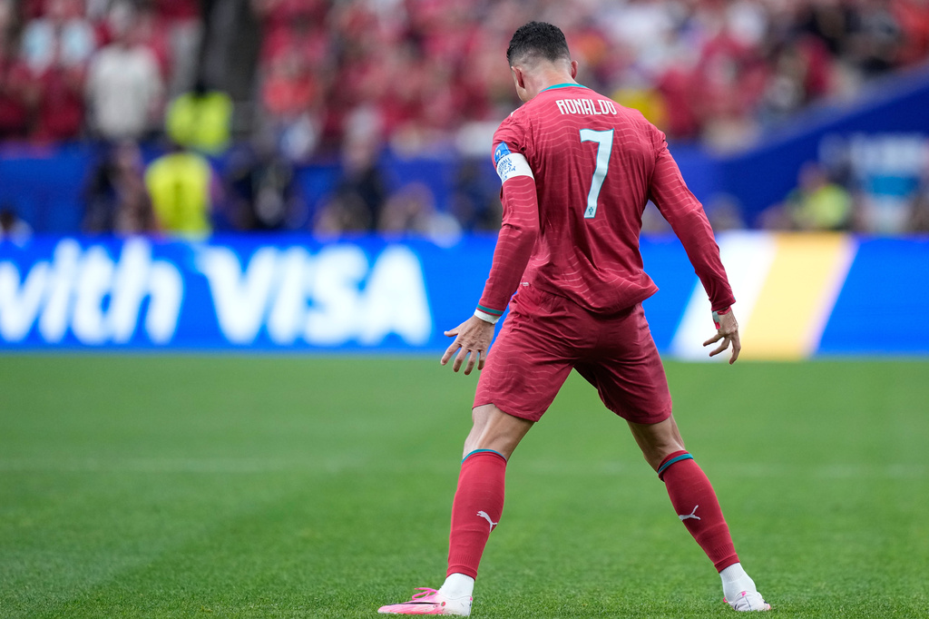 Portugal's Cristiano Ronaldo celebrates after scoring the opening goal during the World Cup Group K soccer match between Portugal and Uzbekistan in Houston, Tuesday, June 23, 2026. (AP Photo/Ashley Landis)
