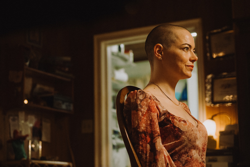 This image released by Focus Features shows Emma Stone in a scene from "Bugonia." (Atsushi Nishijima/Focus Features via AP)