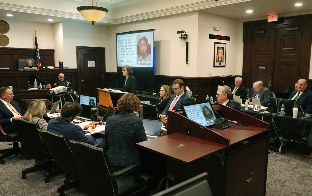 Defense attorney Carole Rendon, for former FirstEnergy CEO Chuck Jones, delivers her closing arguments from the podium in Jones' trial in Summit County Common Pleas Judge Susan Baker Ross's courtroom in Akron on Tuesday, March 17, 2026. (Mike Cardew/Akron Beacon Journal via AP, Pool)