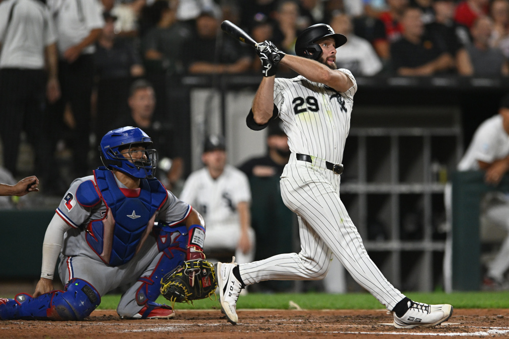 Chicago White Sox's Tristan Peters watches his two-run home during the fifth inning of a baseball game against the Texas Rangers in Chicago, Wednesday, Aug. 26, 2026. (AP Photo/Paul Beaty)