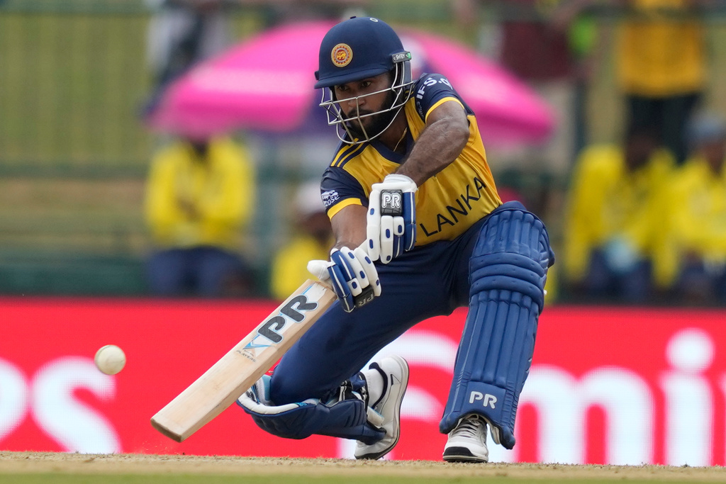 Sri Lanka's Pavan Rathnayake plays a shot during the T20 World Cup cricket match between Oman and Sri Lanka in Pallekele, Sri Lanka, Thursday, Feb. 12, 2026. (AP Photo/Eranga Jayawardena)