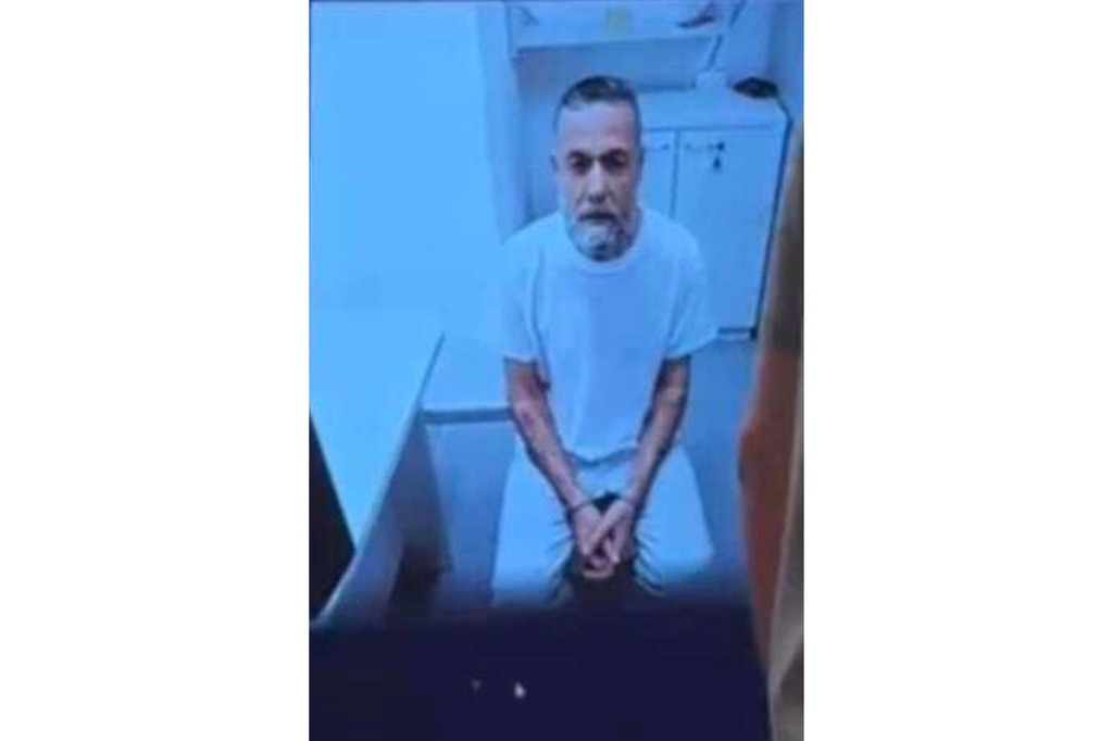 This image provided by the Physicians for Human Rights Israel (PHRI), Dr. Hussam Abu Safiya, who was head of the Kamal Adwan Hospital in Gaza and has been held in Israeli detention for the past 17 months without charge, is seen on a video call from prison during an Israeli Supreme Court hearing of an appeal by his lawyers to end his detention, in Jerusalem, Wednesday, June 10, 2026. (Physicians for Human Rights Israel (PHRI) via AP)