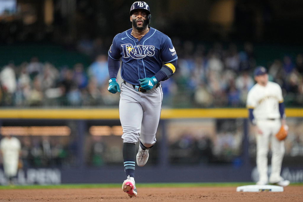 Tampa Bay Rays' Yandy Díaz runs the bases after hitting a two-run home run during the third inning of a baseball game against the Milwaukee Brewers, Wednesday, April 1, 2026, in Milwaukee. (AP Photo/Kayla Wolf)