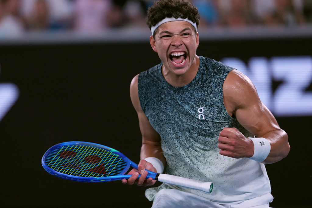 Ben Shelton of the U.S. celebrates after defeating Valentin Vacherot of Monaco in their third round match at the Australian Open tennis championship in Melbourne, Australia, Saturday, Jan. 24, 2026. (AP Photo/Aaron Favila)