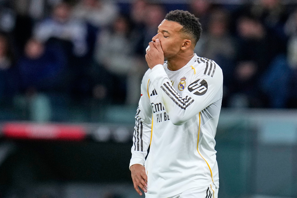 Real Madrid's Kylian Mbappe reacts during the Spanish La Liga soccer match between Real Madrid and Celta Vigo in Madrid, Spain, Sunday, Dec. 7, 2025. (AP Photo/Manu Fernandez)