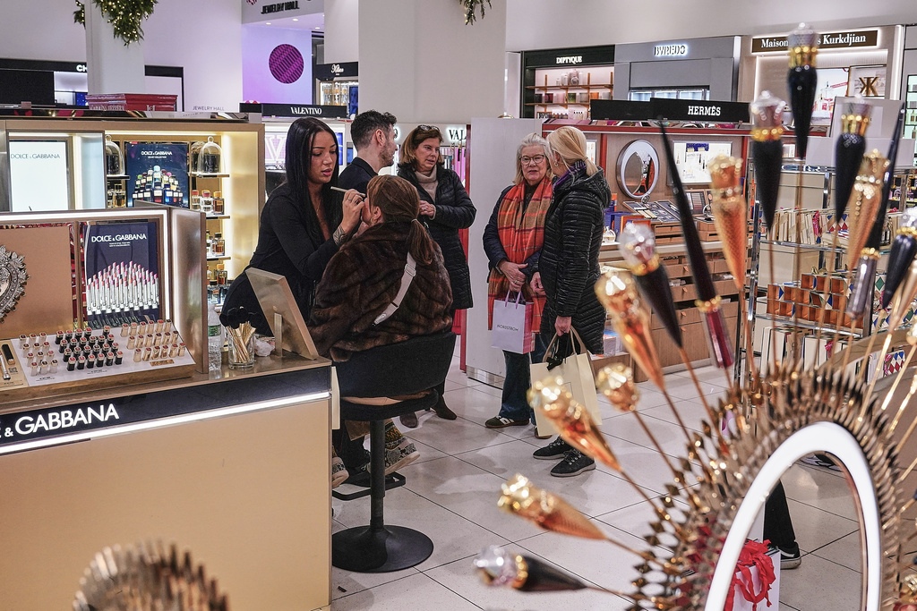 A woman has makeup applied at a Nordstrom department store, in New York, Monday, Dec. 8, 2025. (AP Photo/Richard Drew)