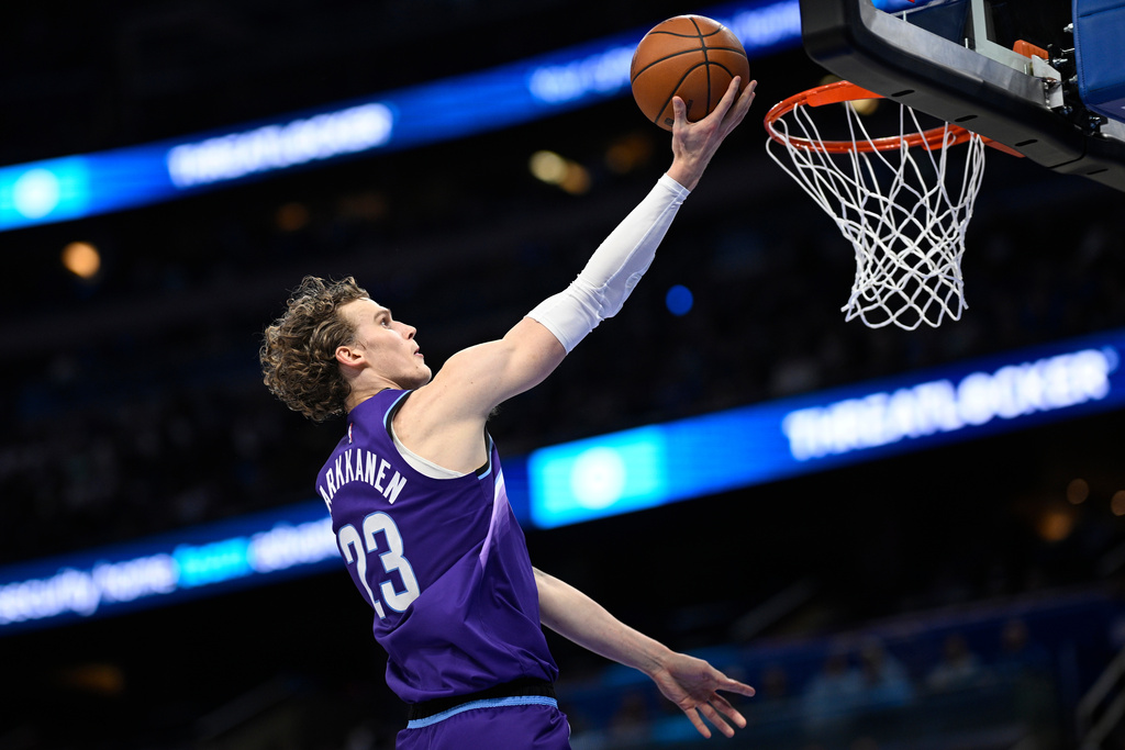 Utah Jazz forward Lauri Markkanen (23) goes up to score against the Orlando Magic during the first half of an NBA basketball game, Saturday, Feb. 7, 2026, in Orlando, Fla. (AP Photo/Phelan M. Ebenhack)