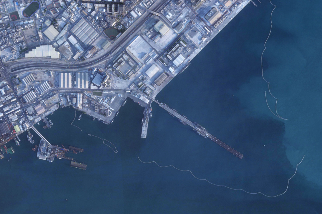 In this satellite photo from Planet Labs PBC, the headquarters of the U.S. Navy's 5th Fleet is seen in Manama, Bahrain, Saturday, Feb. 21, 2026. Ships can be seen at its dock. (Planet Labs PBC via AP)