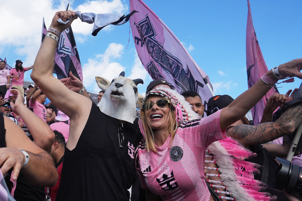 Inter Miami fans cheer before the MLS Cup final soccer match against the Vancouver Whitecaps Saturday, Dec. 6, 2025, in Fort Lauderdale, Fla. (AP Photo/Marta Lavandier)