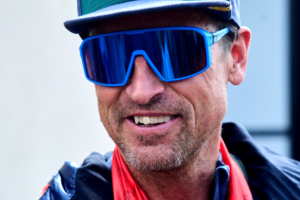 British mountain guide Kenton Cool, who scaled Mount Everest Sunday for the 20th time breaking his own record for the most ascents of the world's highest mountain by a non-Sherpa guide, arrives at the airport in Kathmandu, Nepal, Sunday, May 24, 2026. (AP Photo/Niranjan Shrestha)