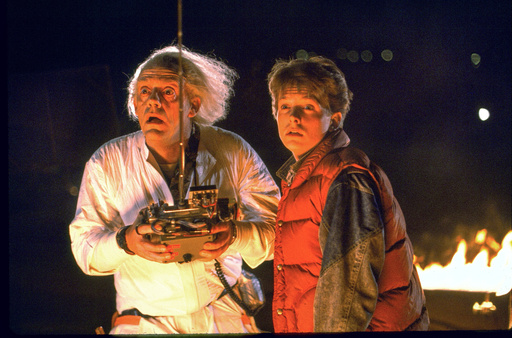 This image released by Universal Pictures shows Christopher Lloyd, left, and Michael J. Fox in a scene from the 1985 film "Back to the Future." (Universal Pictures via AP) This image released by Universal Pictures shows Christopher Lloyd, left, and Michael J. Fox in a scene from the 1985 film "Back to the Future." (Universal Pictures via AP)