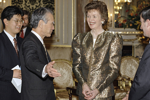 FILE - Irish President Mary Robinson, right, smiles at Japans Prime Minister Tomiichi Murayama, center left, prior to the dinner at the Akasaka Palace, Feb. 23, 1995, Tokyo, Japan. (AP Photo/Shizuo Kambayashi, File) FILE - Irish President Mary Robinson, right, smiles at Japans Prime Minister Tomiichi Murayama, center left, prior to the dinner at the Akasaka Palace, Feb. 23, 1995, Tokyo, Japan. (AP Photo/Shizuo Kambayashi, File)