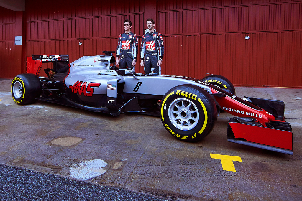 FILE - New F1 Haas team drivers Esteban Gutierrez of Mexico, left, and Romain Grosjean of France pose during the official presentation of the new Ferrari-powered VF16 car at the Catalunya racetrack in Montmelo, just outside of Barcelona, Spain, Monday, Feb. 22, 2016. (AP Photo/Siu Wu, File)